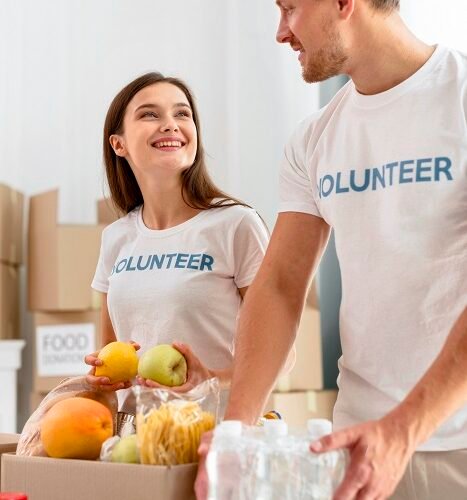 volunteers-work-preparing-food-donations